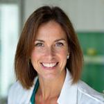 Retrato de la Dra. Isabel Martín, nutricionista amigable, destacando su especialización en alimentación.